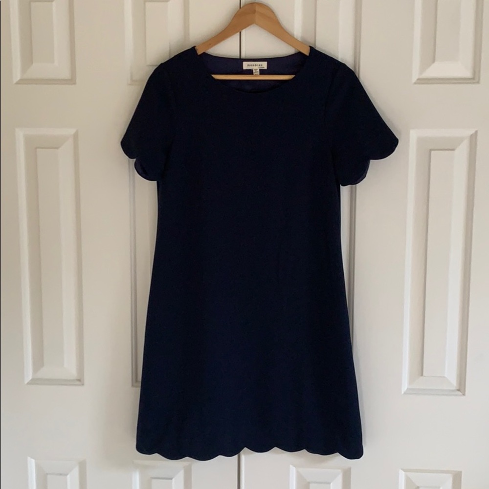 Navy dress with scalloped hem and sleeves